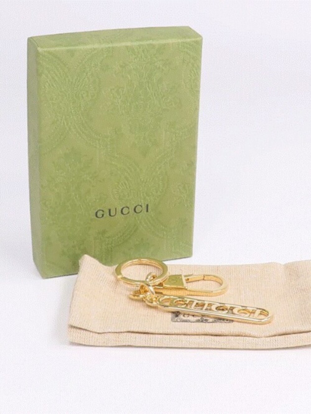 Gucci Gold Tone Keychain with Logo Charm and Clip